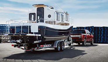 2022 Nissan TITAN Truck towing boat | Jim Click Nissan in Tucson AZ